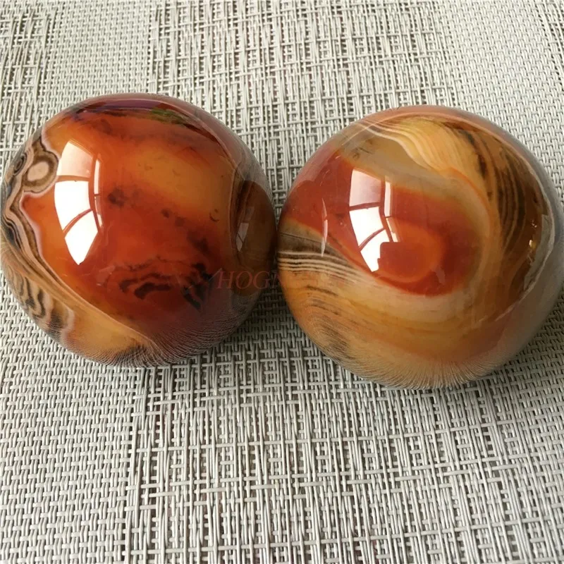 Baoding balls in meditation setting with peaceful background for mindfulness and relaxation.