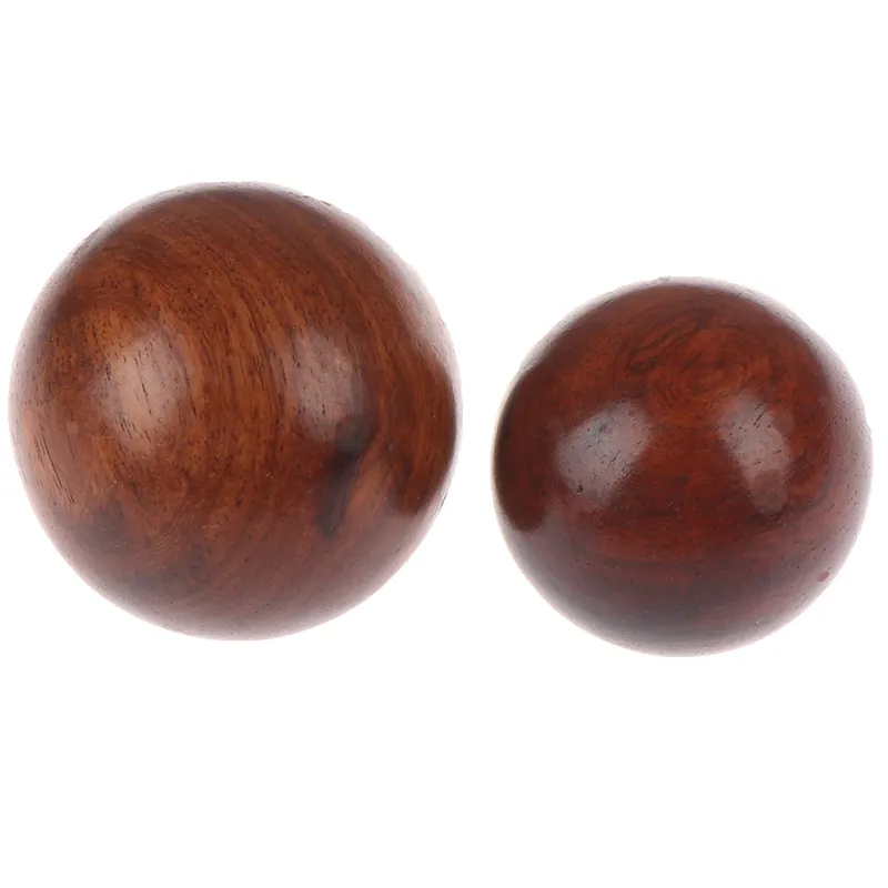Complete Baoding ball set packaging showing two matching agate meditation balls ready for use.
