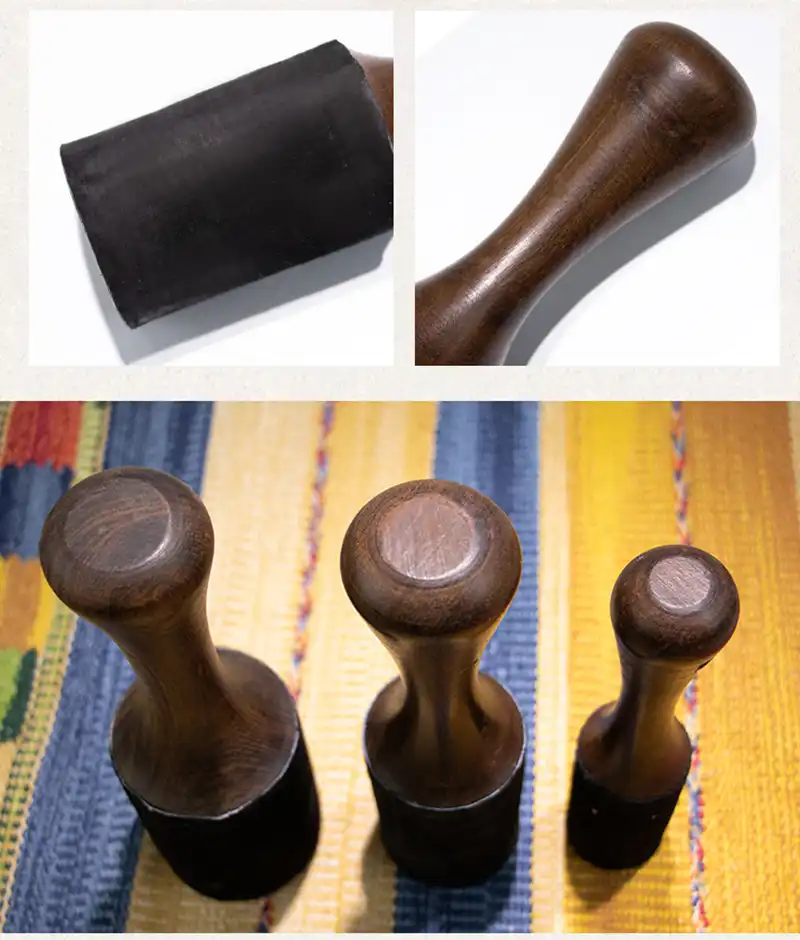 Mallet positioned next to Tibetan singing bowl demonstrating perfect size matching.