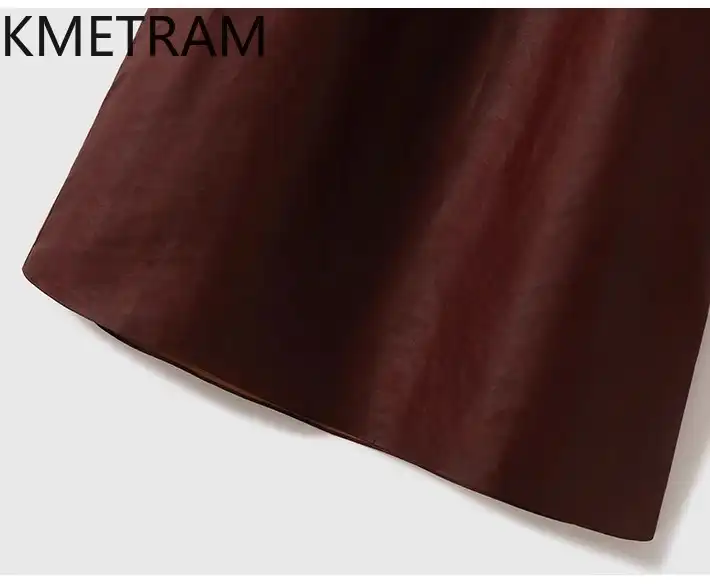 Model wearing premium silk dress demonstrating flattering pencil silhouette and sophisticated styling.