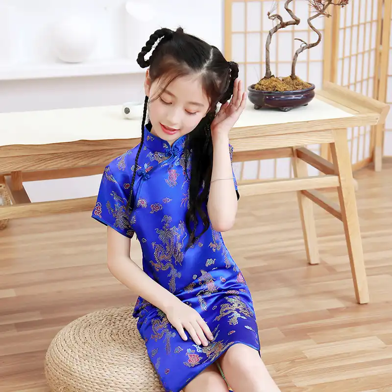 Girls party dress in Chinese style showing modern interpretation of traditional qipao.