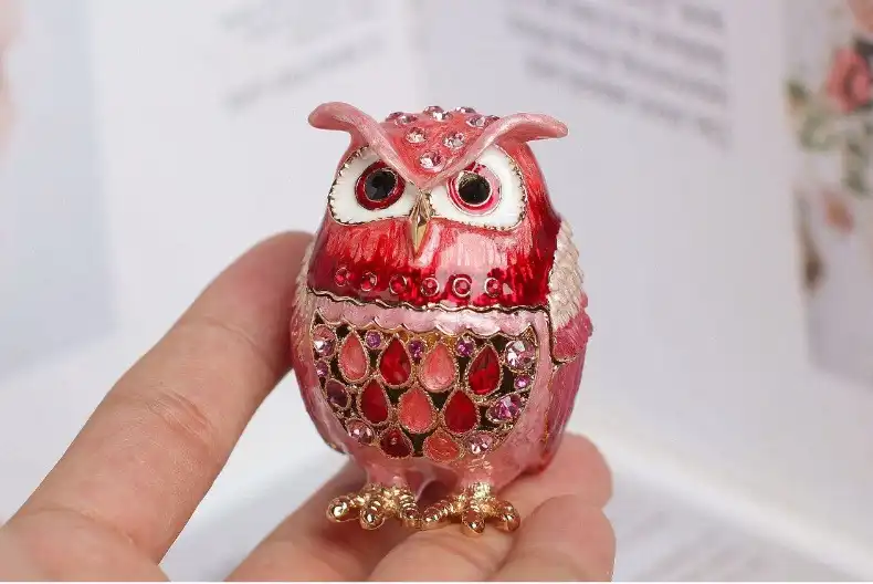 Cloisonne owl storage box with lid open revealing interior space for jewelry organization.