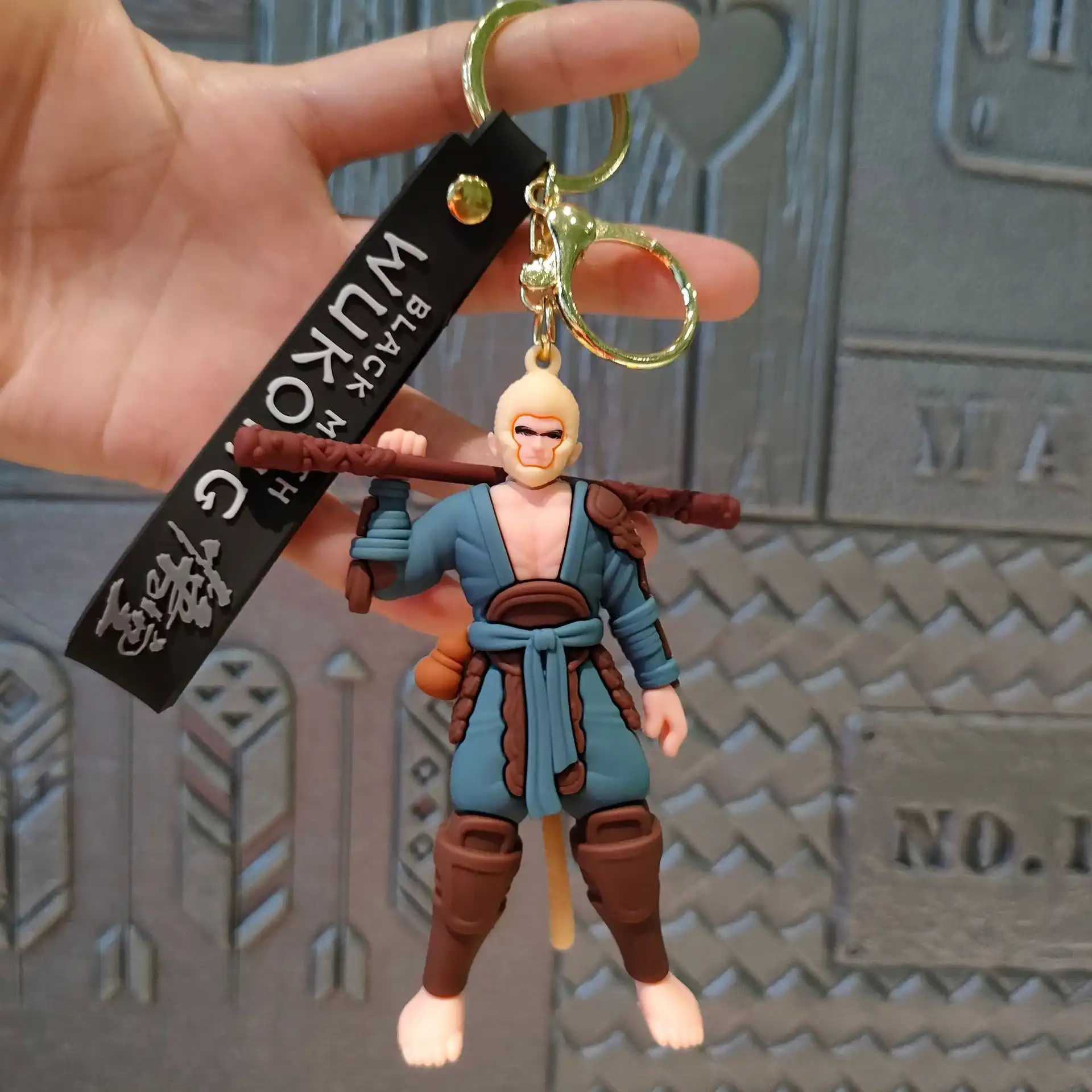 Gaming collectible keychain pendant displaying anime-inspired Monkey King artwork with durable construction materials.