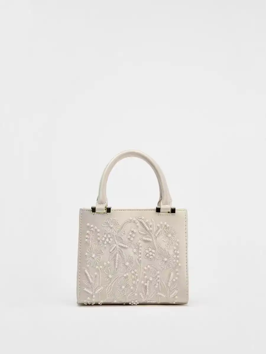 Spacious interior of embroidery tote bag displaying ample storage capacity and quality lining.