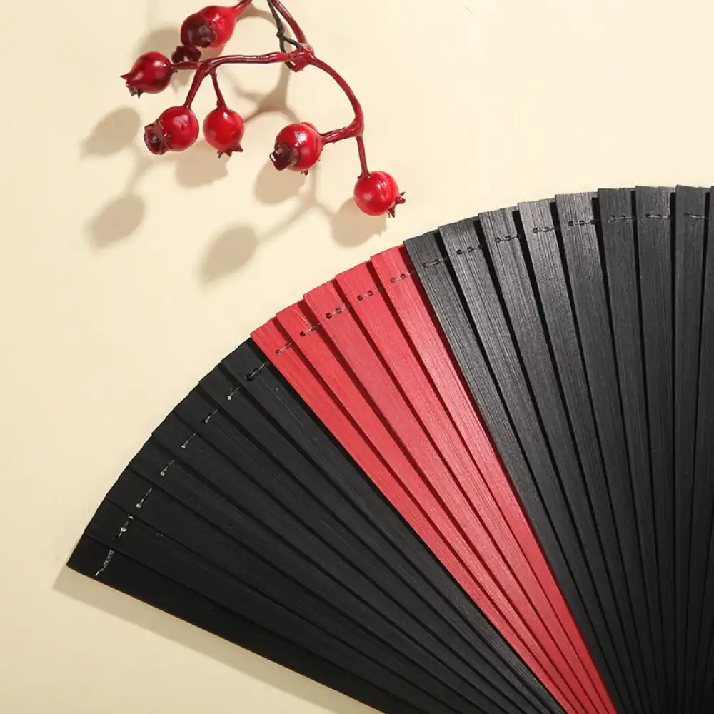 Antique style dance fan displaying vintage aesthetic and traditional design elements.