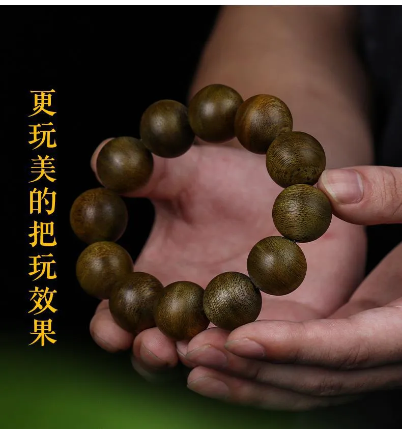 Unisex agarwood Buddhist bracelet worn by both male and female models in meditation pose.