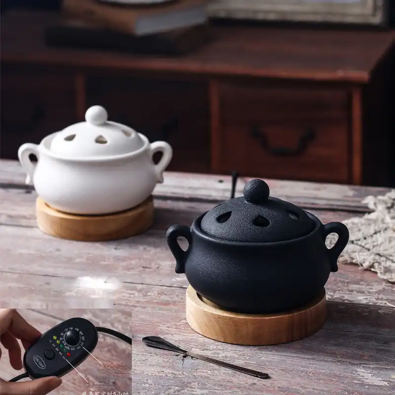 Electric aroma diffuser in home setting demonstrating 1.5m power cord and placement flexibility.