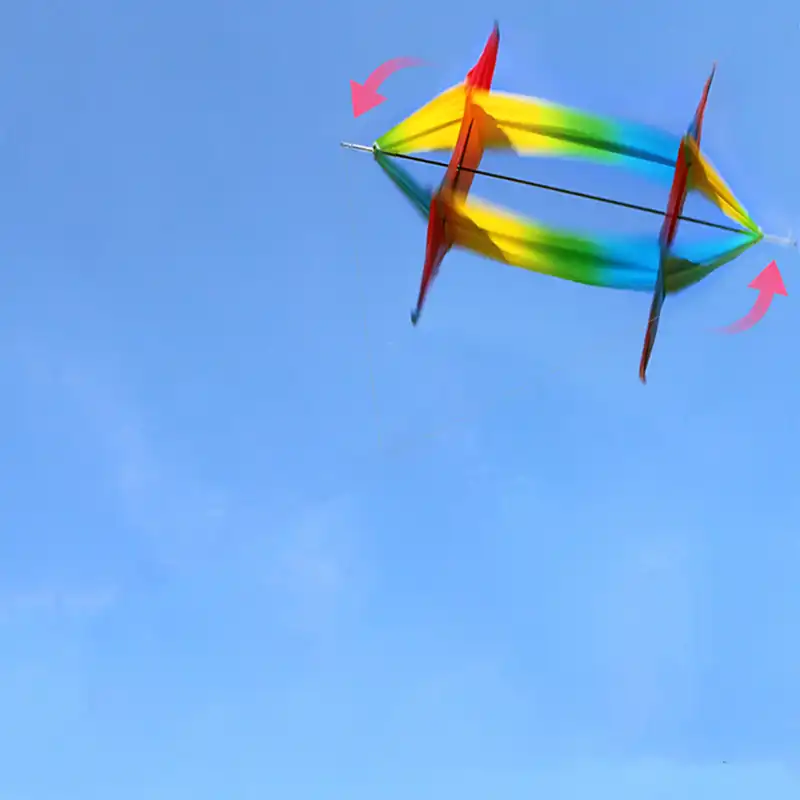 Multiple colorful fish kites flying together creating beautiful sky display at park.