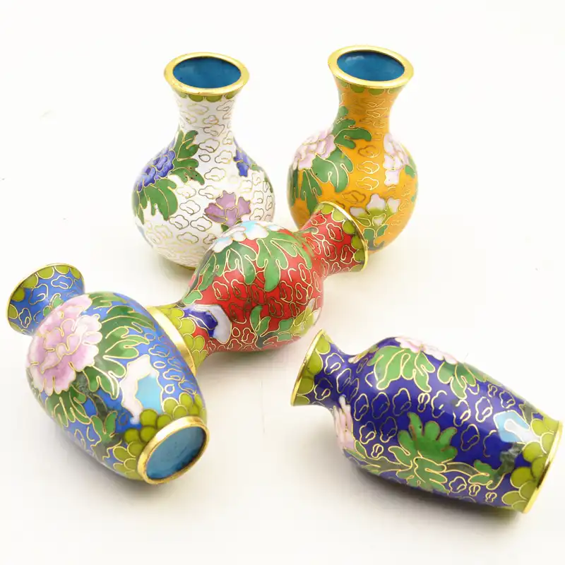Traditional Beijing Jingtai blue landscape and floral motifs on authentic enamel vases.