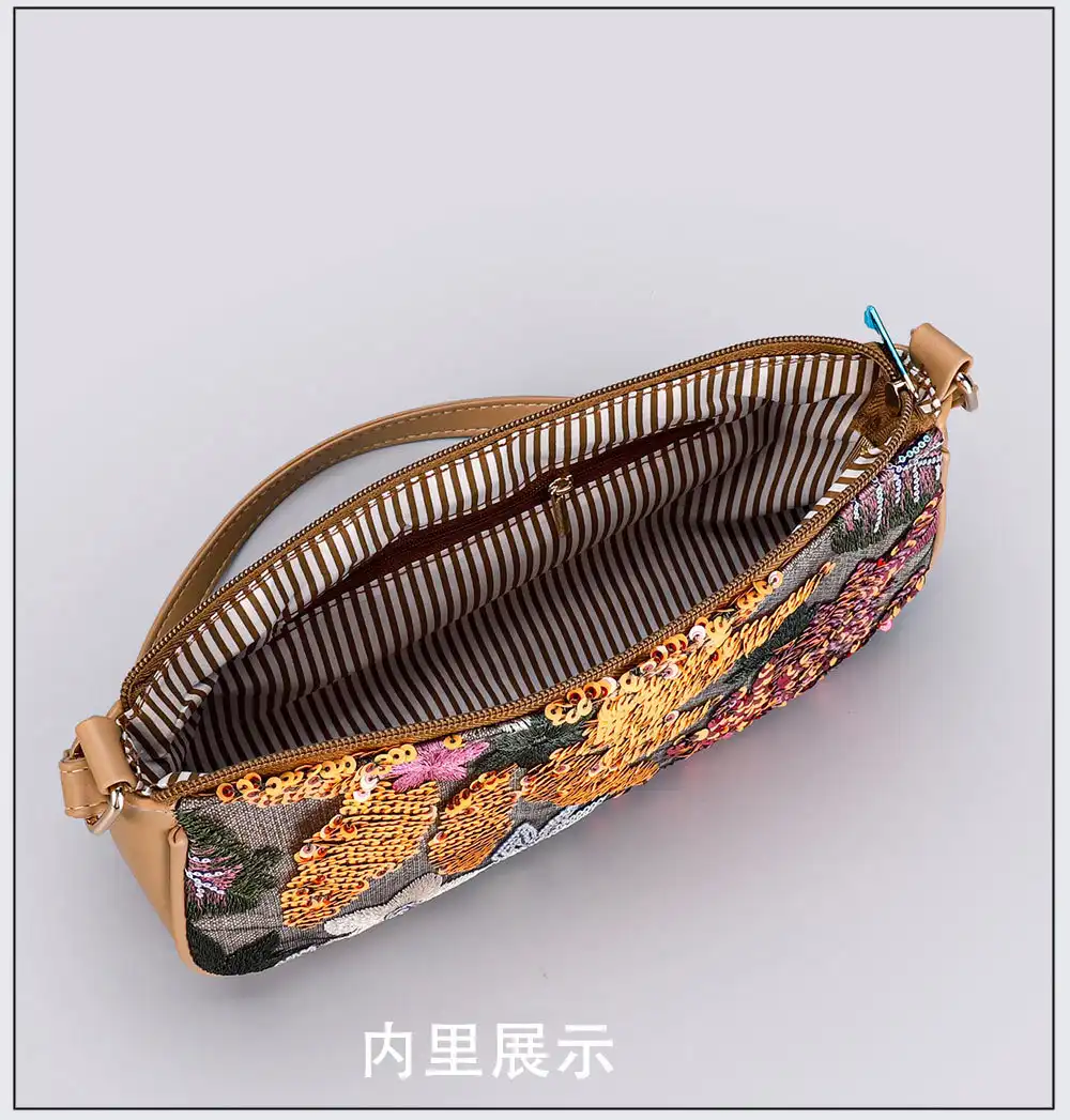 Flat lay arrangement displaying bag dimensions and overall baguette shape design.
