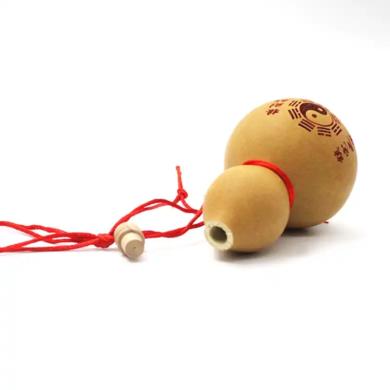 Traditional carved gourd photography prop with authentic Chinese cultural symbols and patterns.