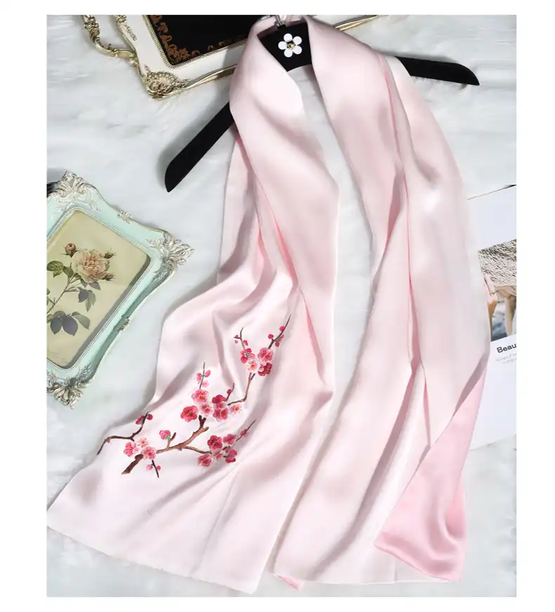 Suzhou embroidery womens accessory displaying traditional artistry on contemporary fashion piece.
