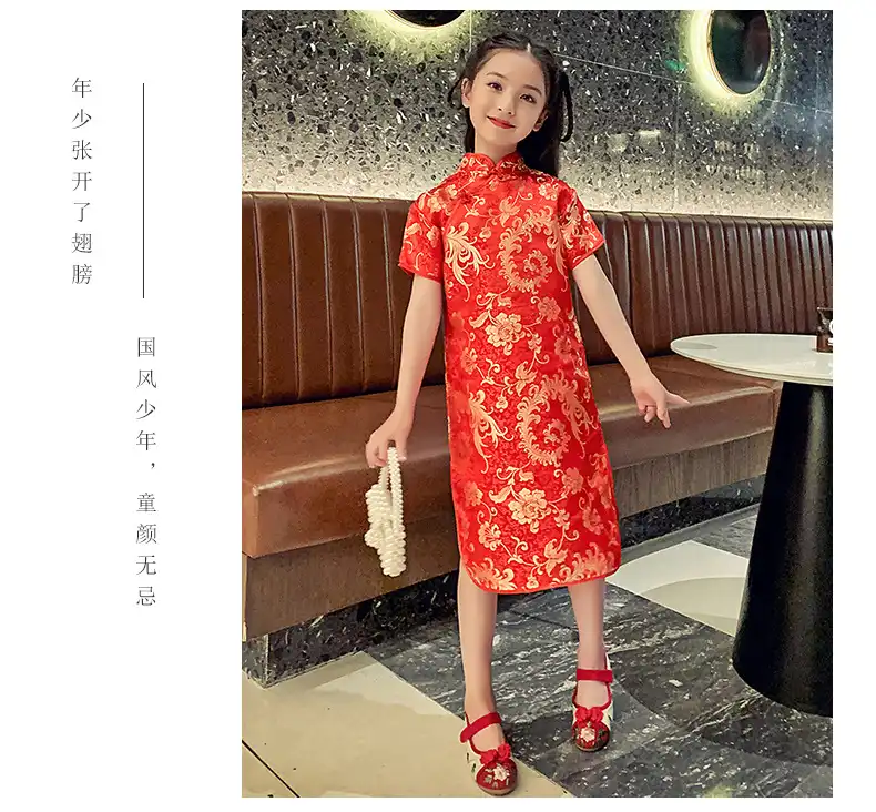 Girls Chinese dress in gold showing luxurious broadcloth polyester fabric quality.