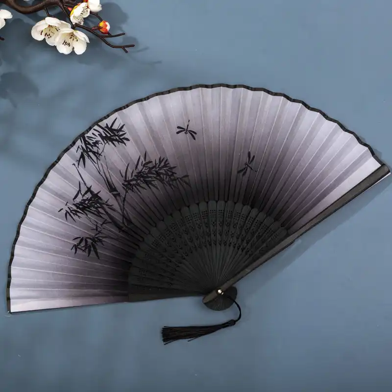 Seasonal celebration decor incorporating folding fans as festive thematic elements.