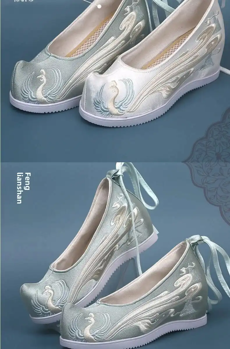 Chinese wedding shoes photographed from above showing symmetrical phoenix embroidery design pattern.