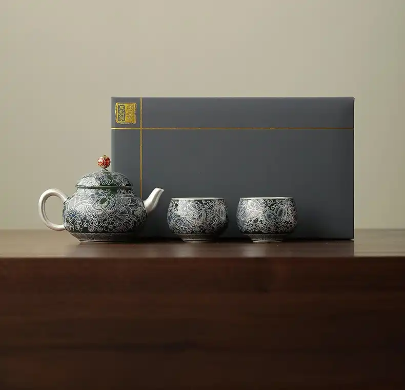 Classical Chinese tea ceremony demonstration using Palace Museum butterfly cloisonne tea set pieces.