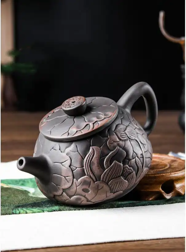 Artistic lotus illustration teapot collection showcasing unique handmade variations and cultural heritage.