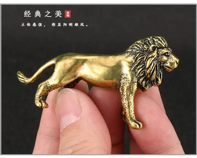 Feng shui arrangement featuring the lion statue positioned for prosperity and strength symbolism.