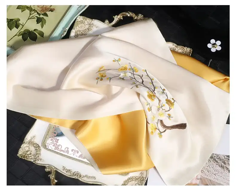 Double layered mulberry silk scarf showing both decorative and functional design elements.