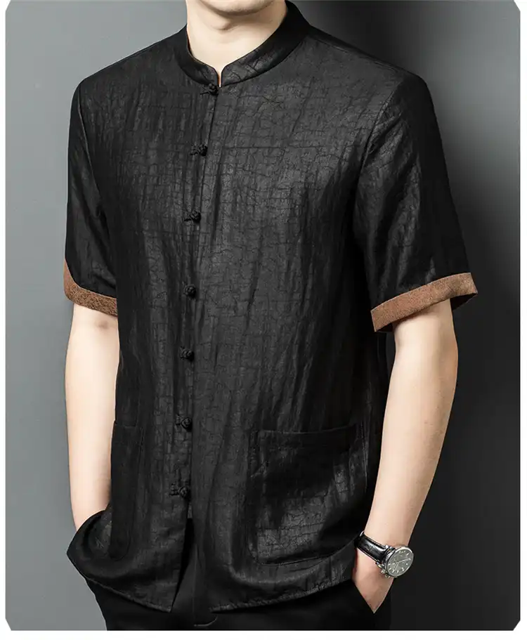 Lifestyle image of Gambiered silk shirt styled with casual summer accessories and clothing.
