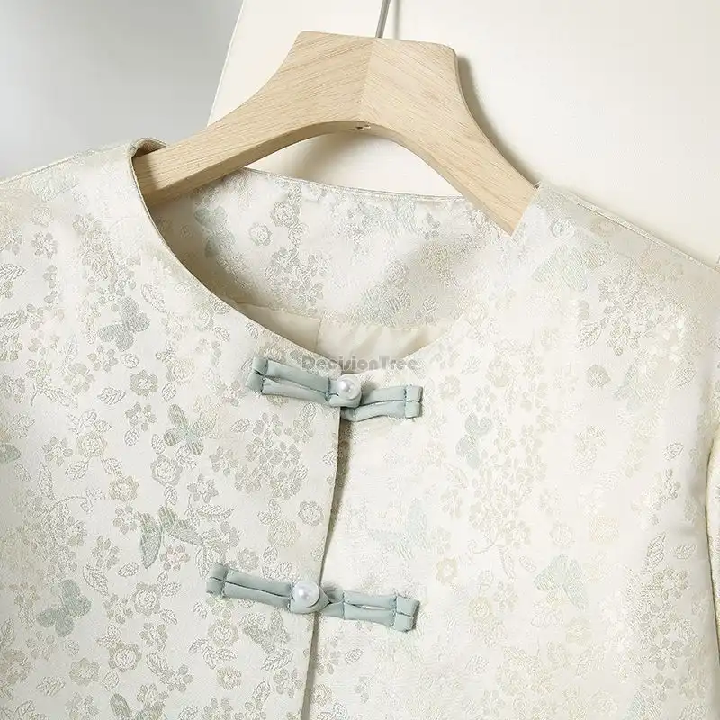 Women's tang suit shirt styled for casual daily wear with modern accessories.