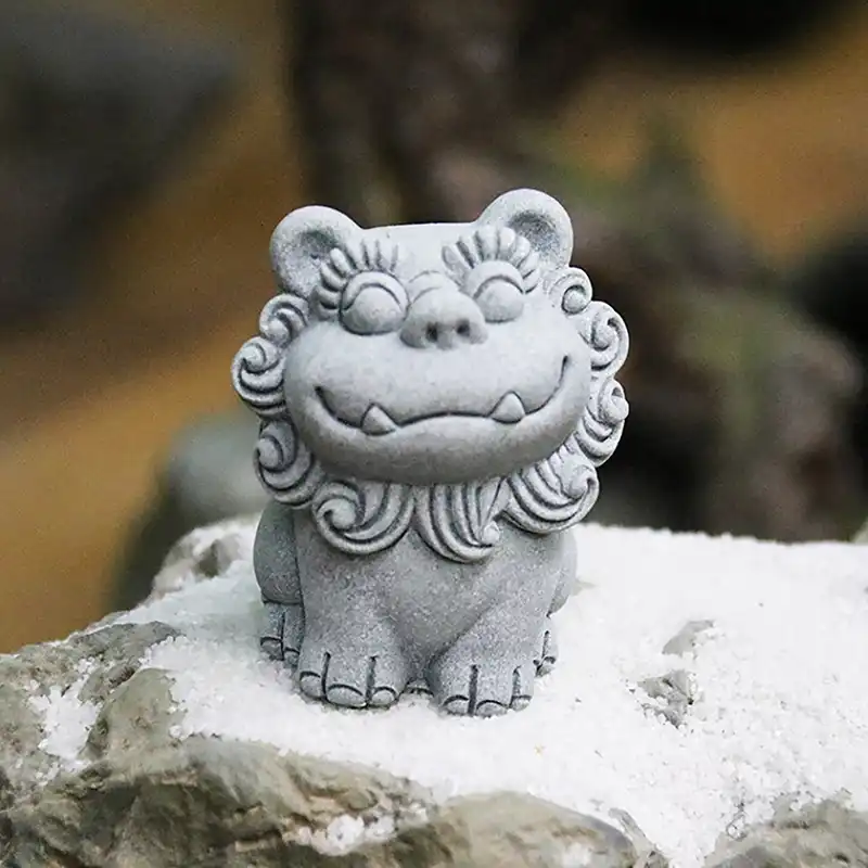 Feng shui guardian lions displayed on wooden surface showing versatile home decor applications.