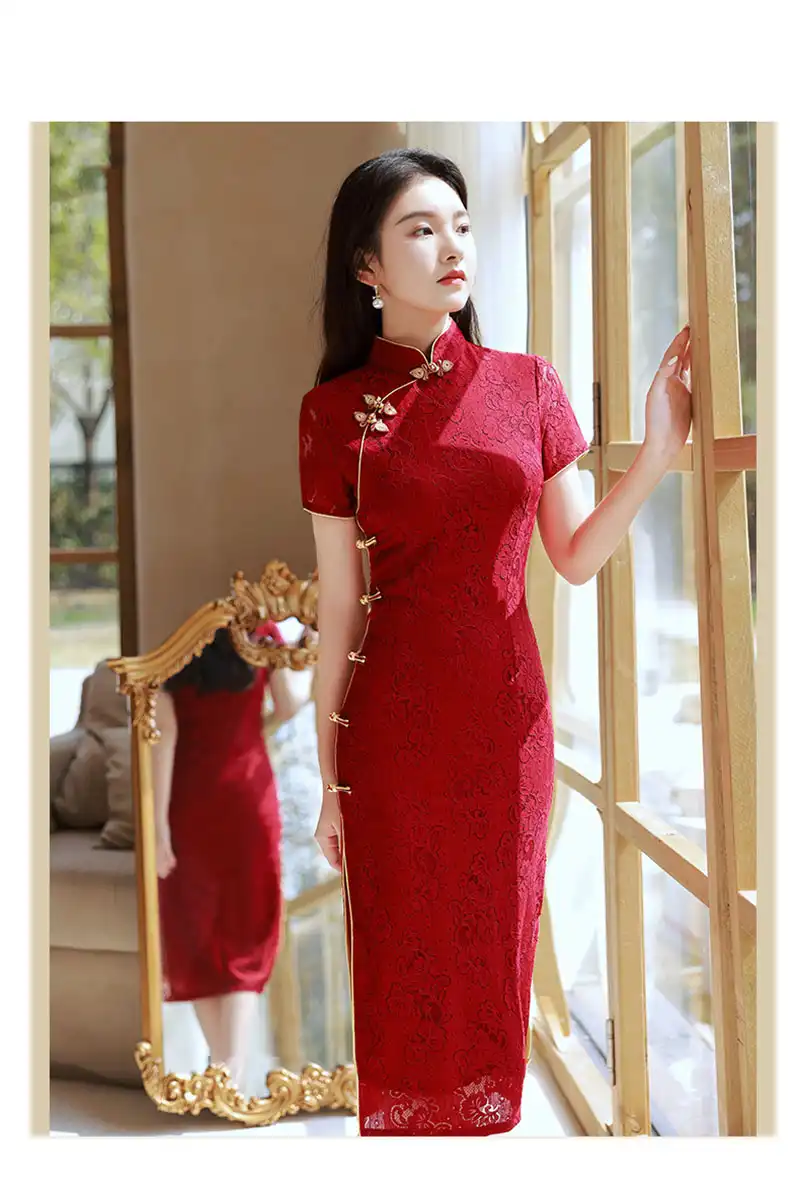 Model wearing vintage wine red qipao showing slim-fit silhouette and short sleeve design.