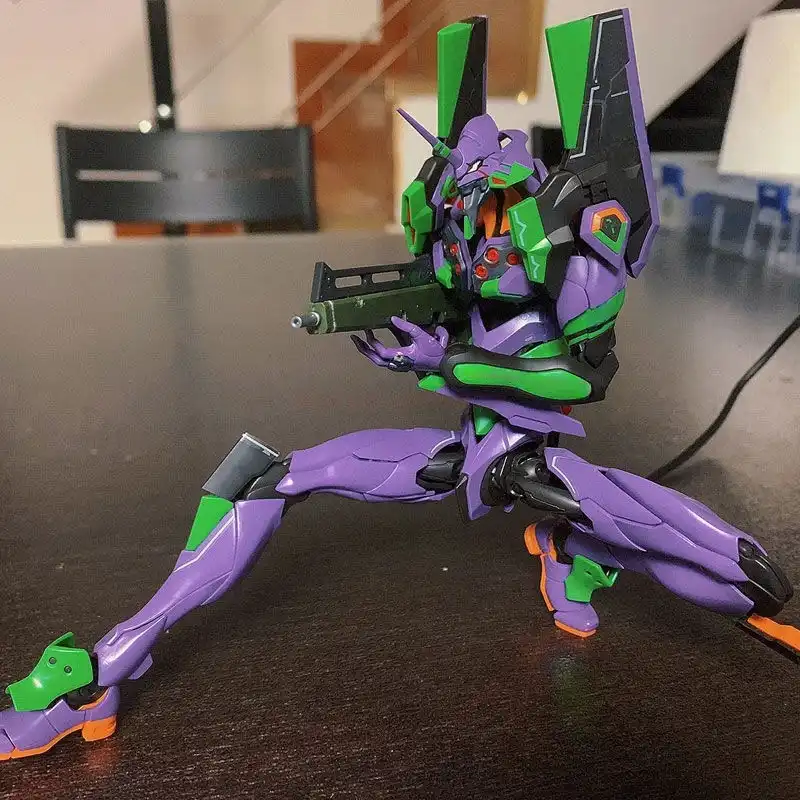 Evangelion 01 PVC model kit, displayed with other anime figures..