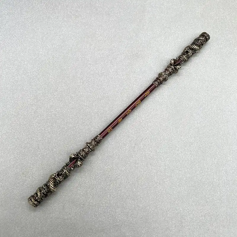 Hand holding Black Myth Wukong staff model demonstrating 30cm size scale