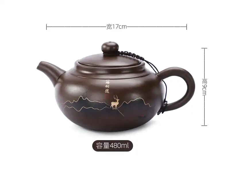 Traditional Chinese tea ceremony setup with authentic Yixing purple clay beauty teapot and cups.