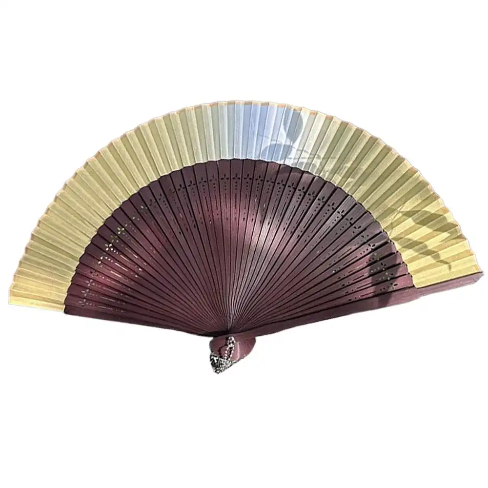 Professional photography using silk bamboo fan as creative prop and visual element.
