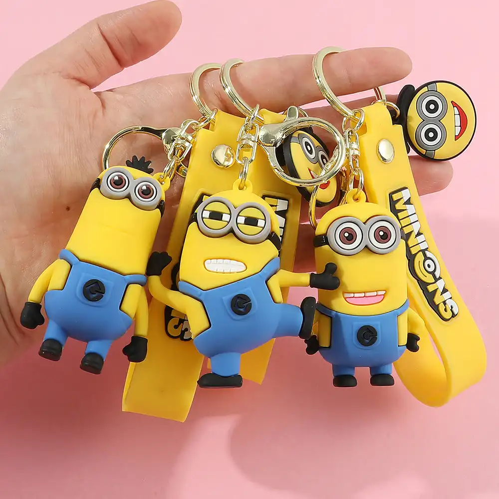 Minions keychain on backpack zipper showing how it enhances student school bag decoration.