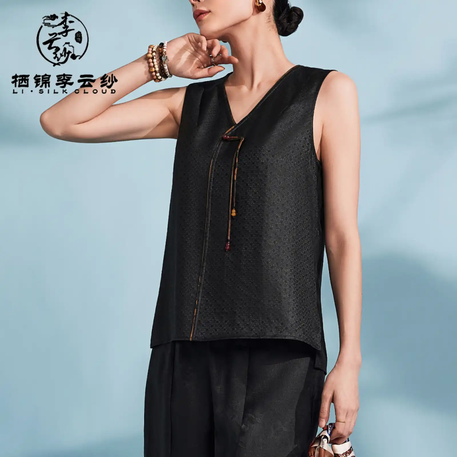 Full styling shot showcasing tank top layered with summer outfit for versatile wear.