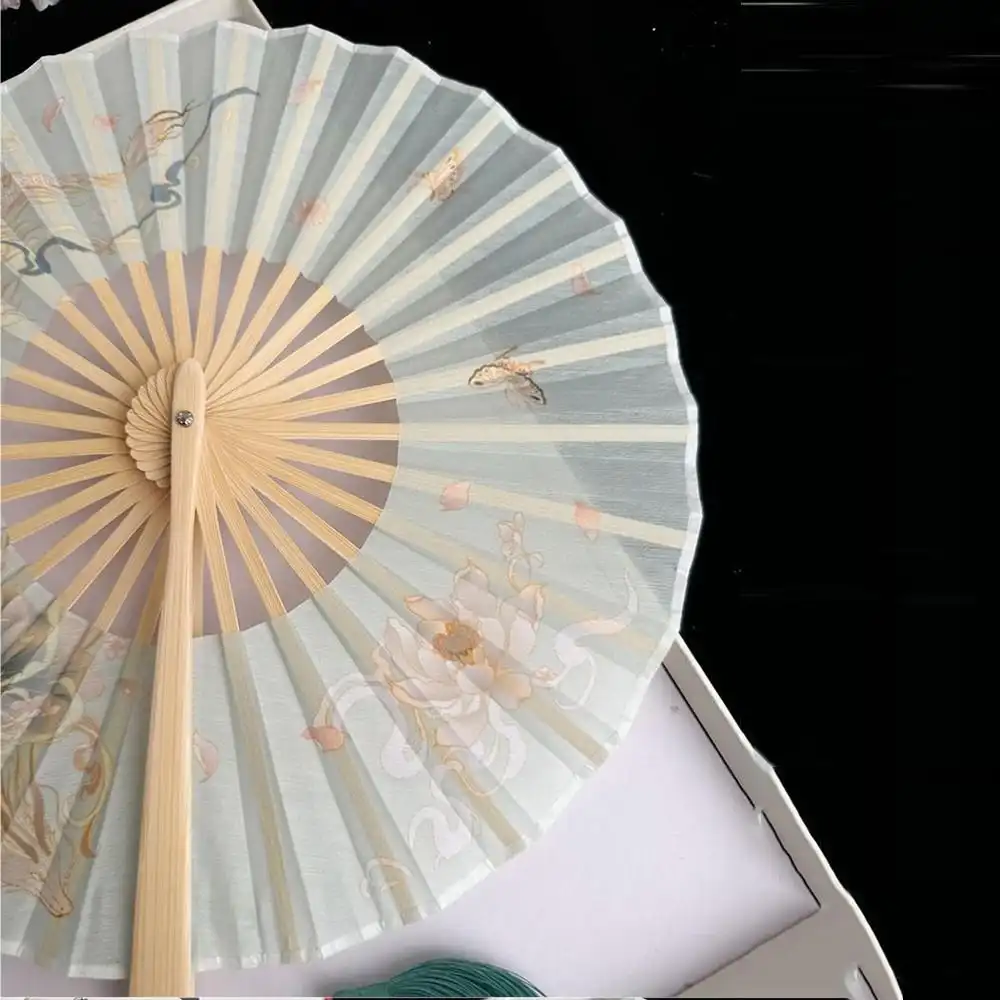 Handmade bamboo fan ribs construction detail highlighting quality and durability.