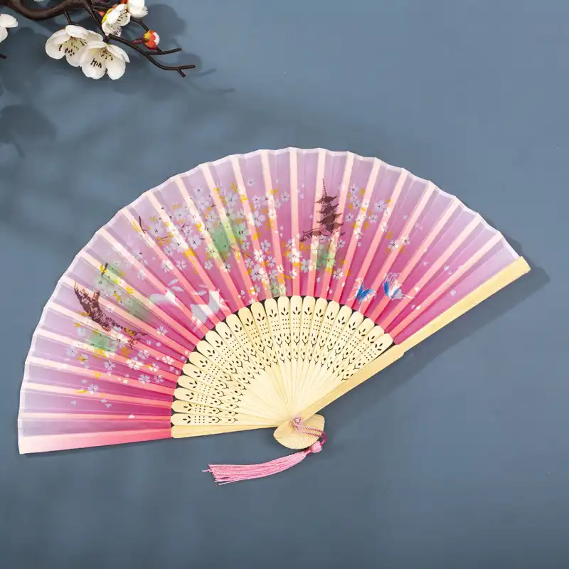 Quality materials showcase highlighting bamboo ribs and silk fabric construction details.