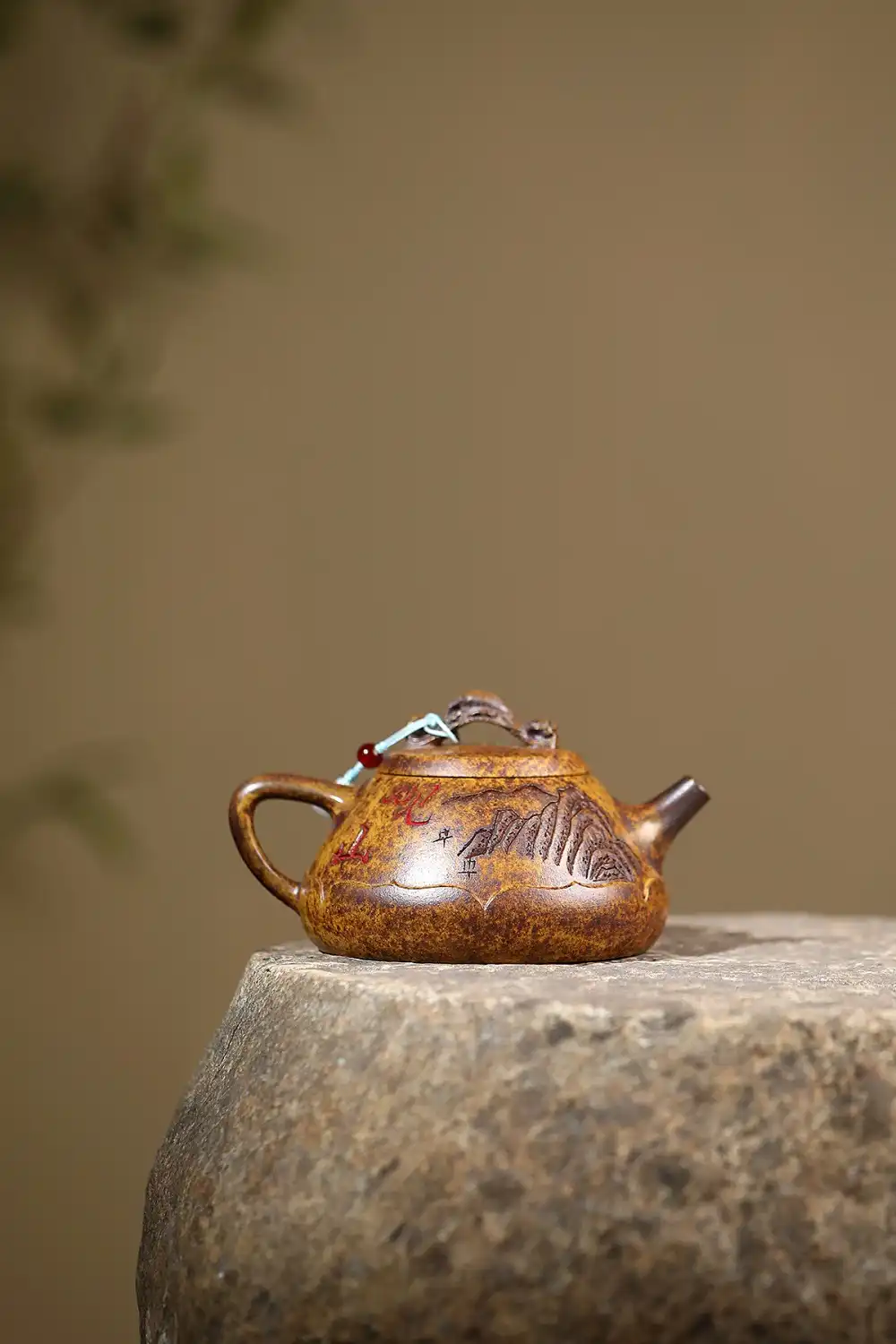 Gift presentation of authentic stone ladle teapot with tiger mountain view design for tea enthusiasts.