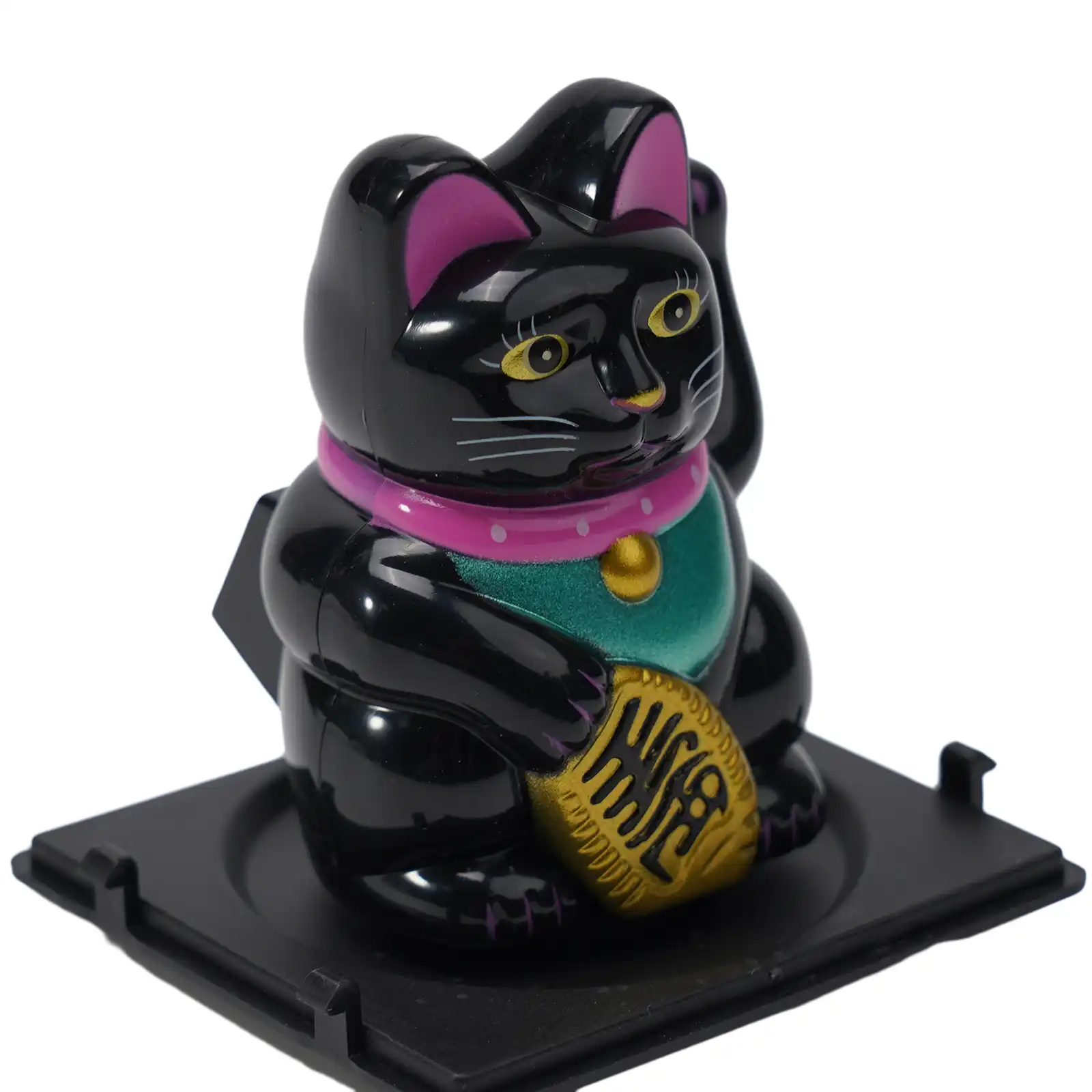 Maneki neko ornament creating memorable and enjoyable car ownership experience.