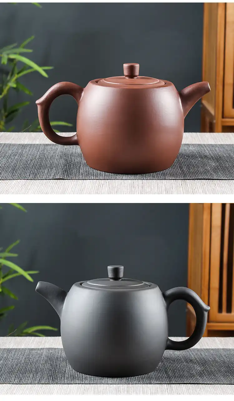 Complete traditional tea set arrangement featuring large capacity Yixing teapot as centerpiece.