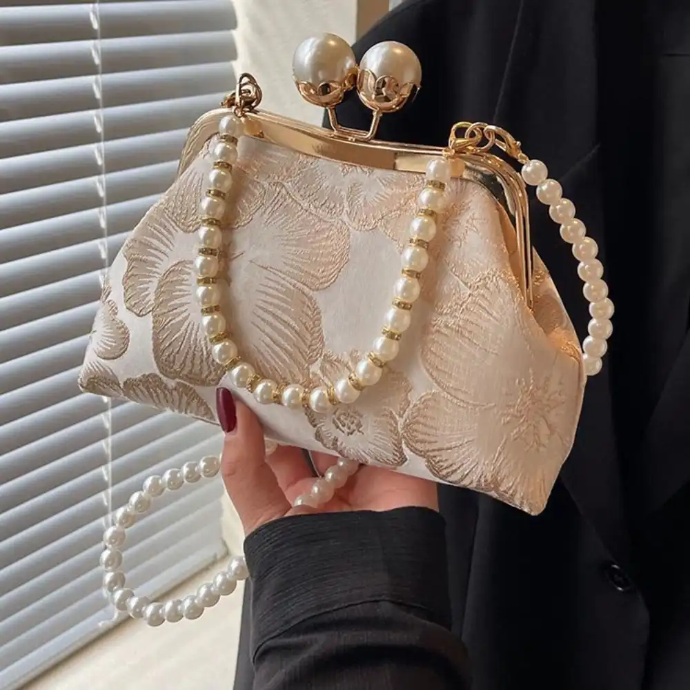 Craftsmanship detail showing quality silk material and expert embroidery techniques.