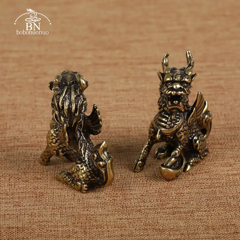 Full view of bronze Qilin statue pair highlighting traditional Chinese mythical beast design.