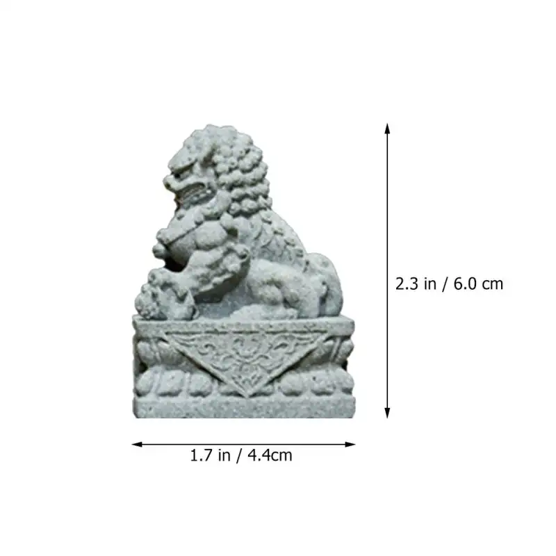 Lifestyle image of stone lion pair complementing home office decor and workspace styling.